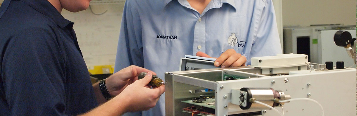 An operator fixing an AutoGC system.